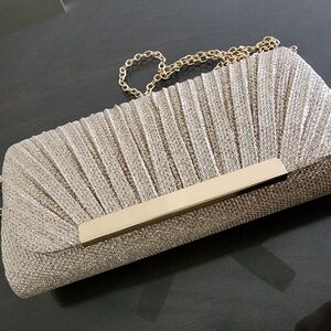 Elegant Gold Tone Clutch Bag